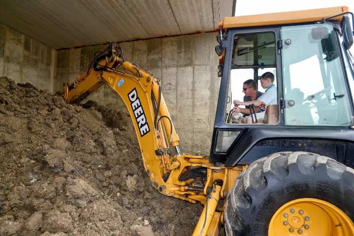 Boy with Digger Public Works Open House 2015